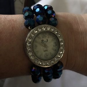 L & J stainless steel watch